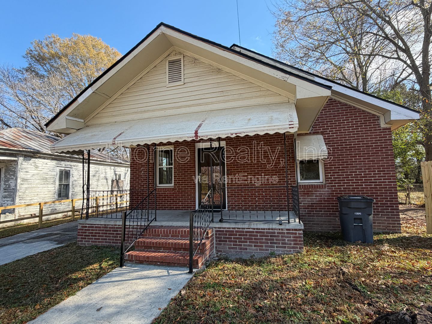 $200 off first month's rent!! 2 Bedroom Brick House, Covered Porch, Hardwood floors, Central HVAC property image