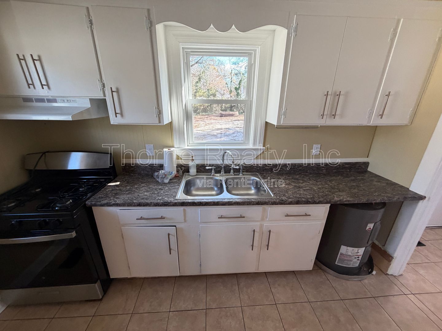 $200 off first month's rent!! 2 Bedroom Brick House, Covered Porch, Hardwood floors, Central HVAC property image