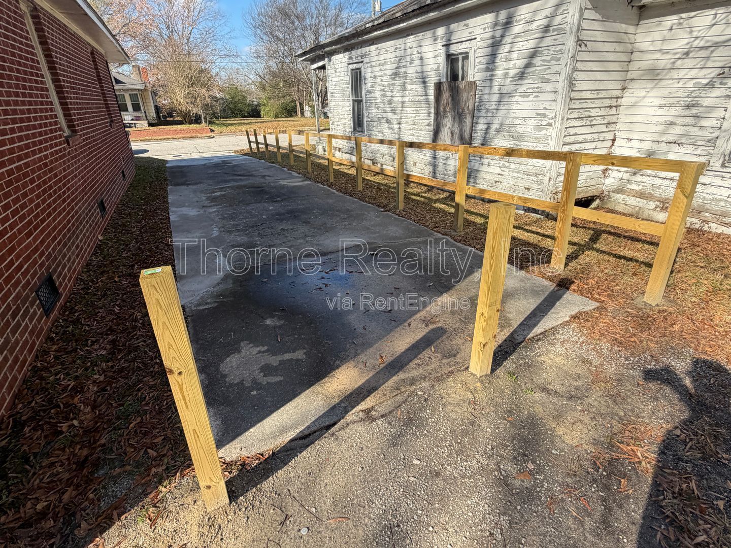 $200 off first month's rent!! 2 Bedroom Brick House, Covered Porch, Hardwood floors, Central HVAC property image