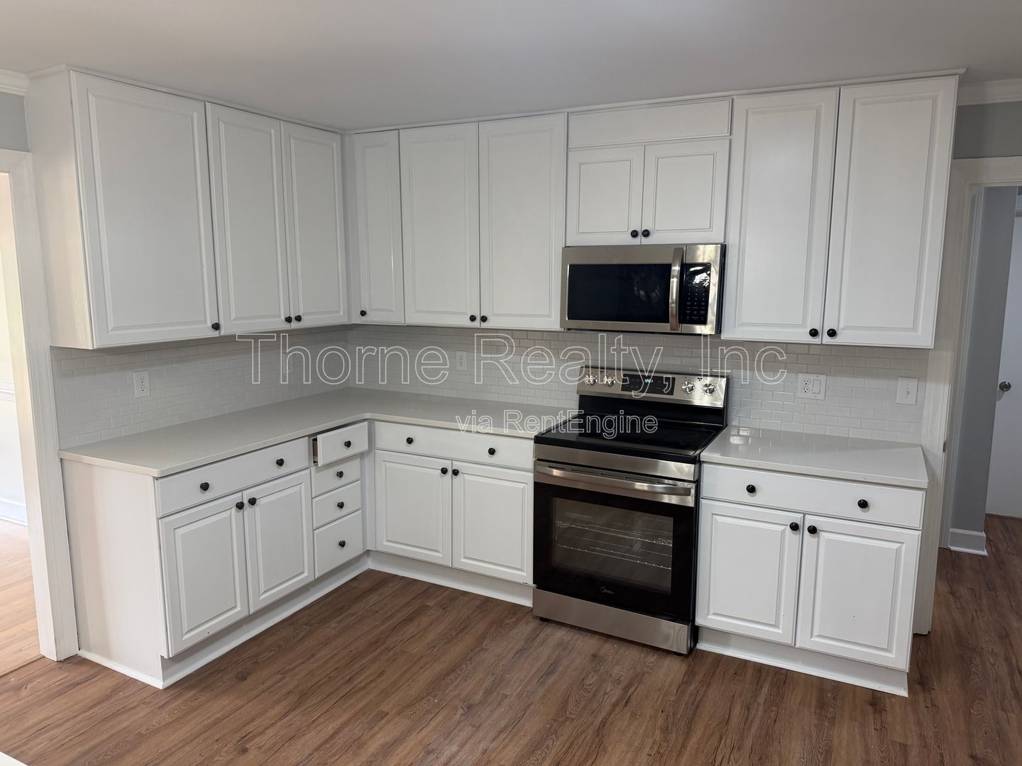 Large renovation  just completed - Brick ranch on corner lot with double car garage property image