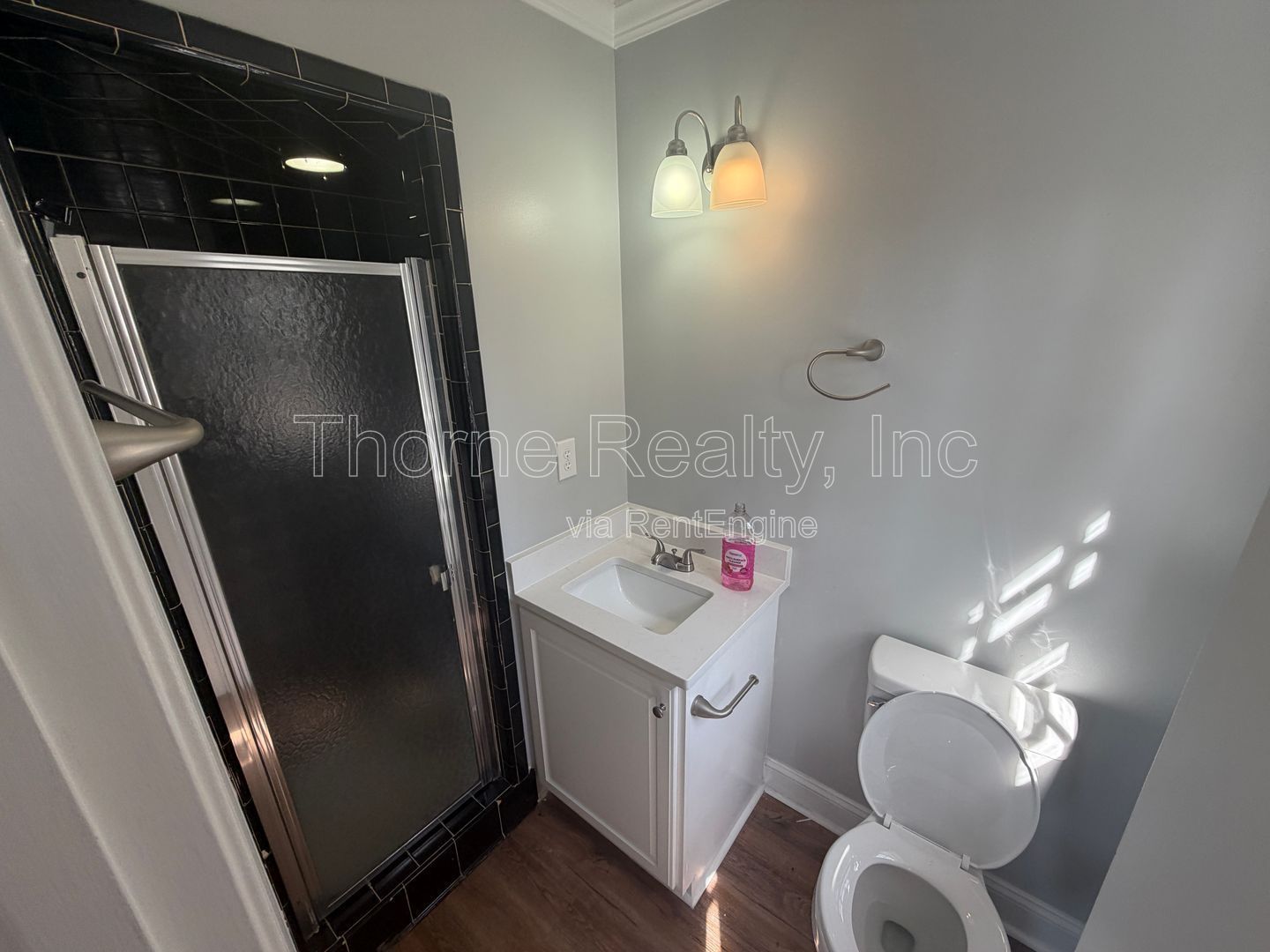 Large renovation  just completed - Brick ranch on corner lot with double car garage property image