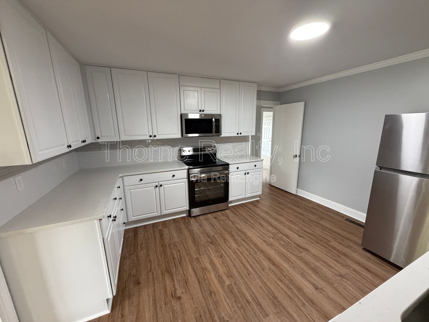 Large renovation  just completed - Brick ranch on corner lot with double car garage property image