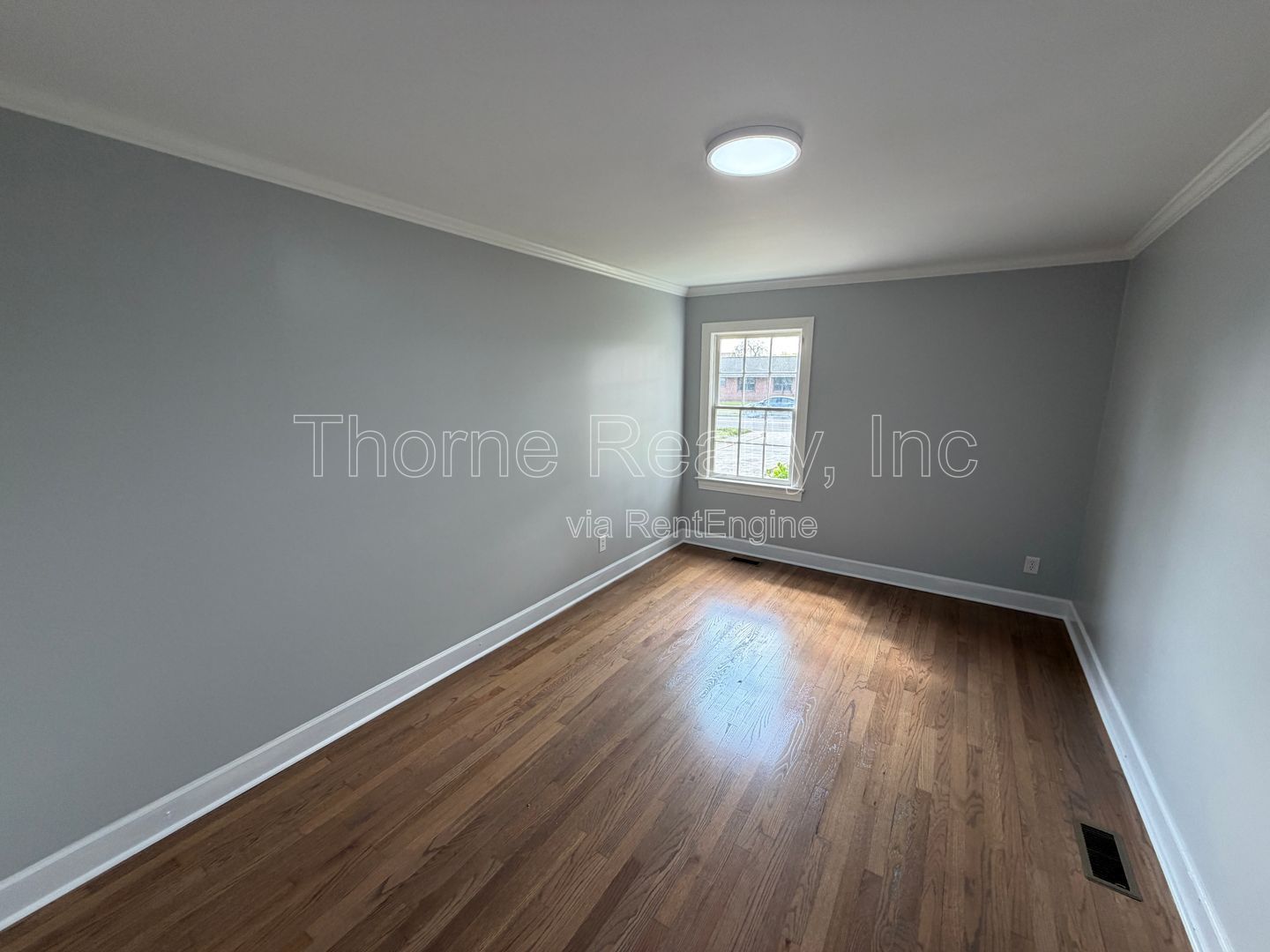 Large renovation  just completed - Brick ranch on corner lot with double car garage property image