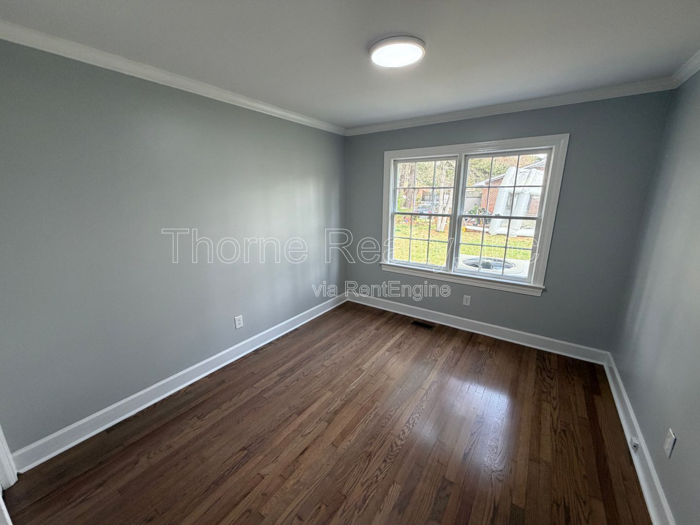 Large renovation  just completed - Brick ranch on corner lot with double car garage property image